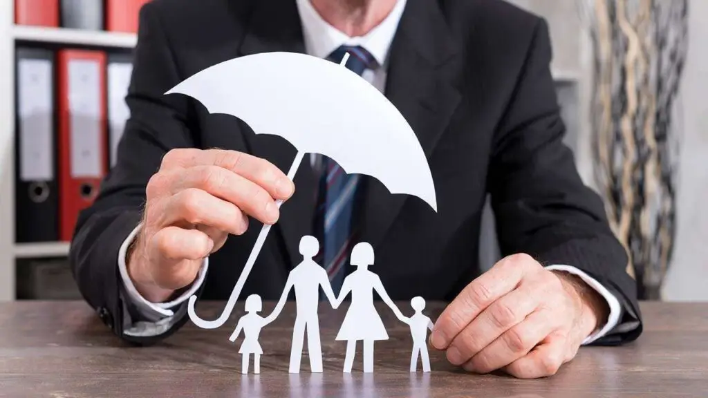 Independent insurance agency providing life insurance protection for families under an umbrella symbol, representing financial security and coverage.